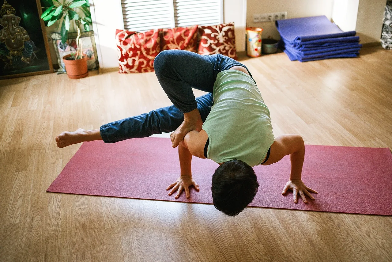Yoga session on a mat, symbol of a wellness workshop