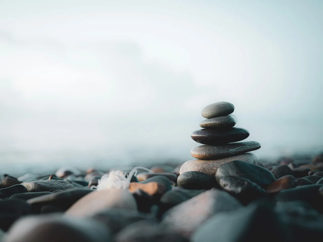 Stacked pebbles at the seaside, symbol of calm